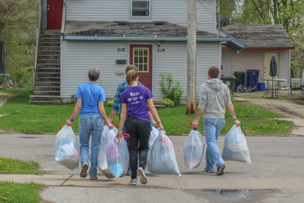 Far Reach Team Carries Garbage Bags